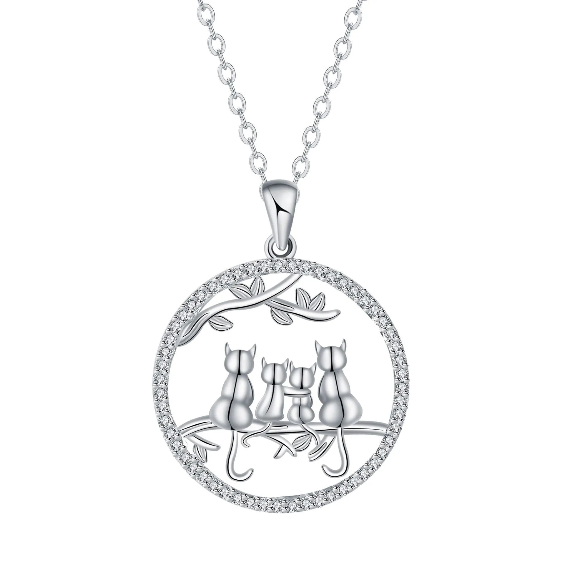 Close-up of a copper necklace featuring a pendant with four kittens in an original design, on a cross chain.