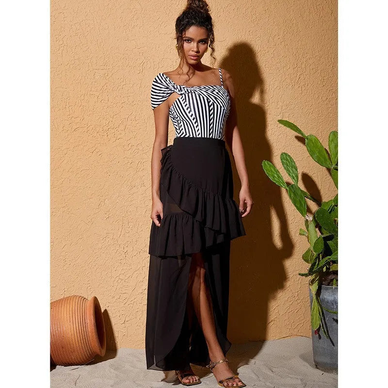 Women's one-piece ruffled striped polyester swimsuit with black skirt, sleeveless, available in multiple sizes