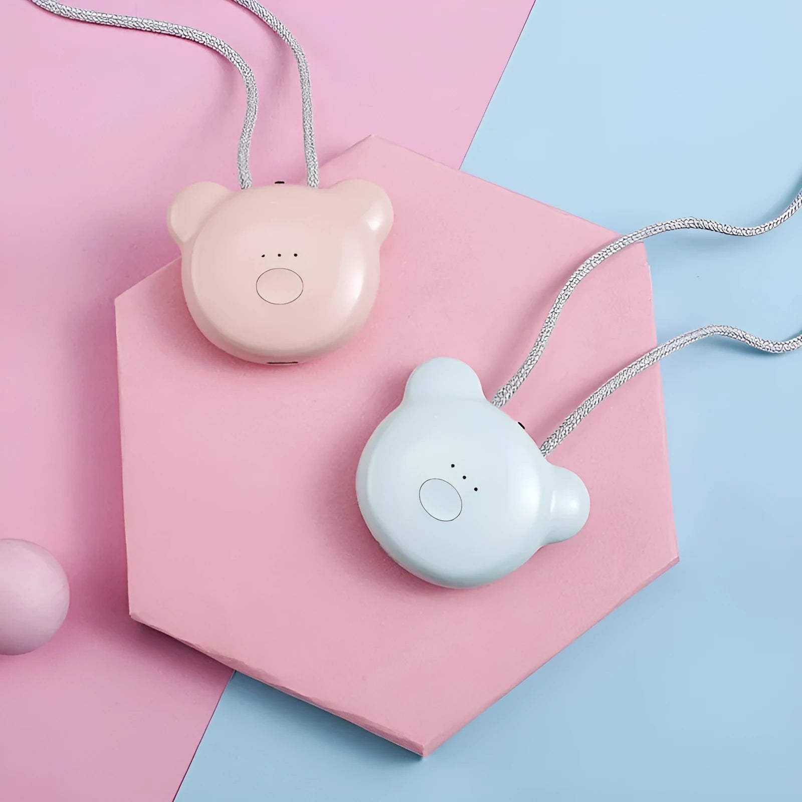 Mini USB portable air purifier necklace in blue colour, showing wearable design and single button.