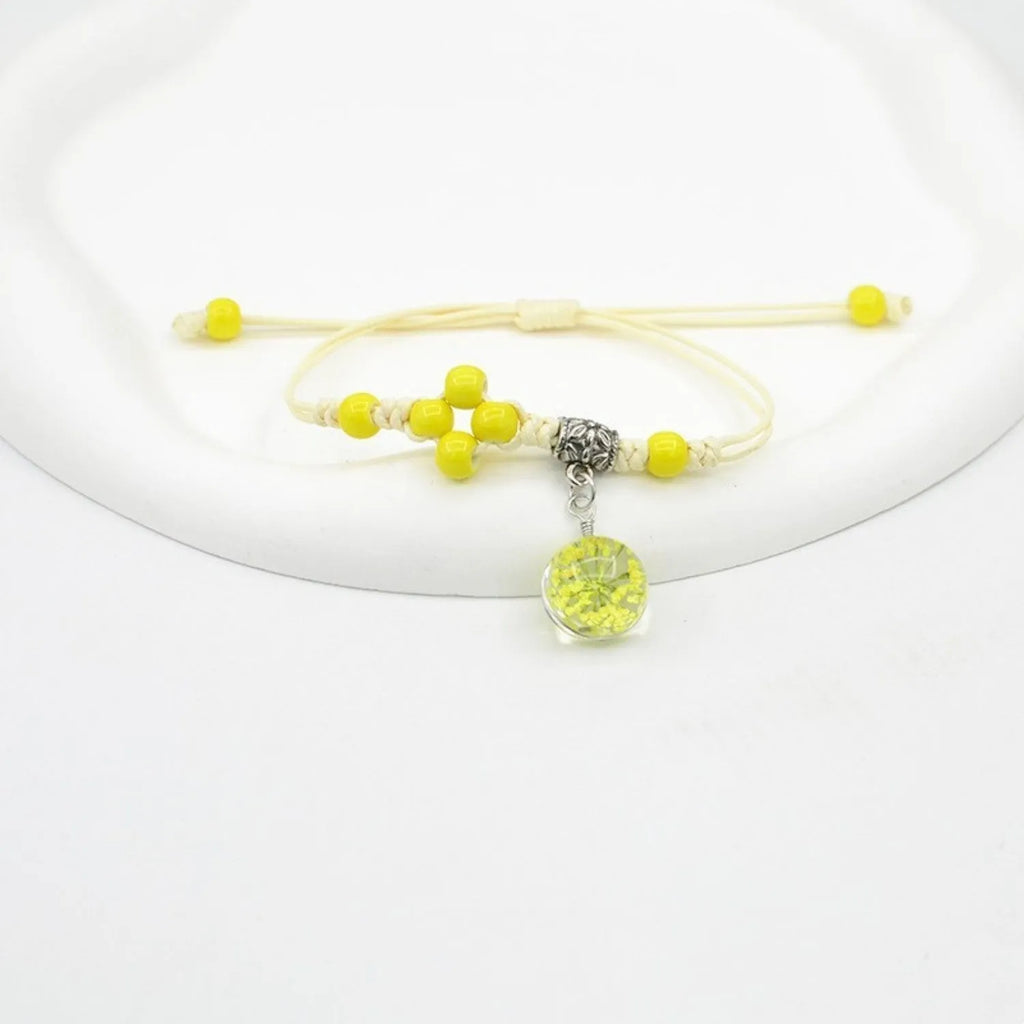 Glass dried flower bracelet with lace detailing and large 1.4cm beads in multiple colours.