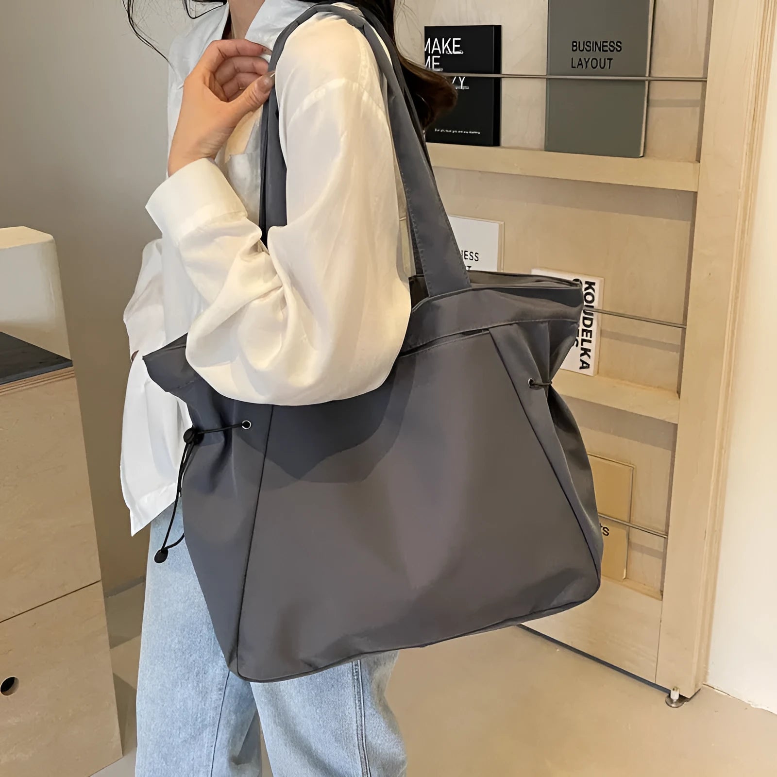 Soft folding Oxford cloth tote bag in a street style, shown in multiple colour options.