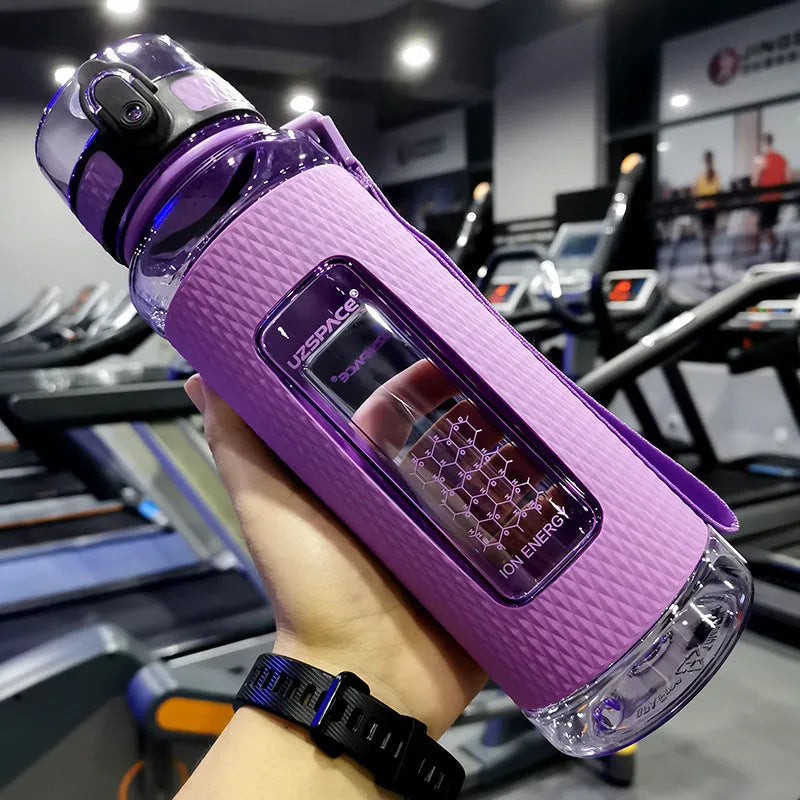 Portable sport water bottle in blue, copolymer polyester plastic, 1100ml capacity, with black cap.