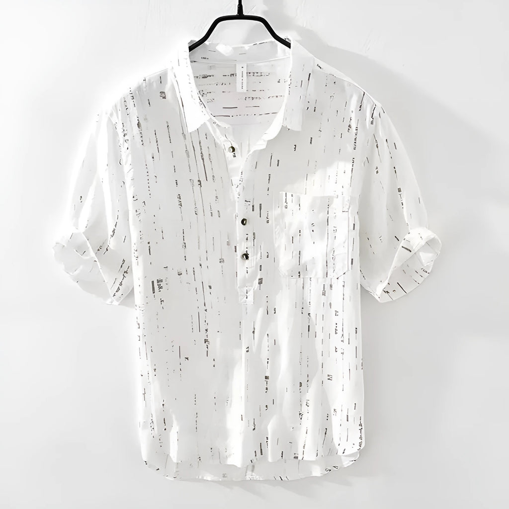 Men's loose fit short sleeve lapel polo shirt in black or white, shown on a hanger.