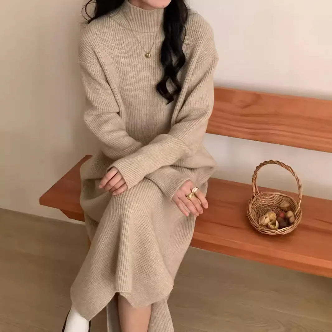 Acrylic knitted half turtleneck dress in beige colour with long sleeves and high waist midi skirt.