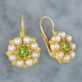Gold retro flower alloy earrings with electroplated finish, 2.5 cm diameter, on a neutral background