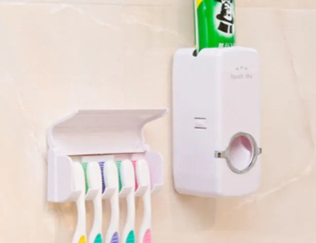 White and wine red plastic silicone toothbrush holder set with suction mount on a bathroom tile wall
