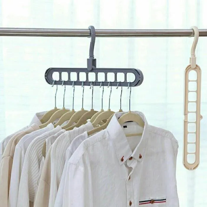 Plastic clothes hanger with 360° rotating hook, 33 cm long, in green colour on white background