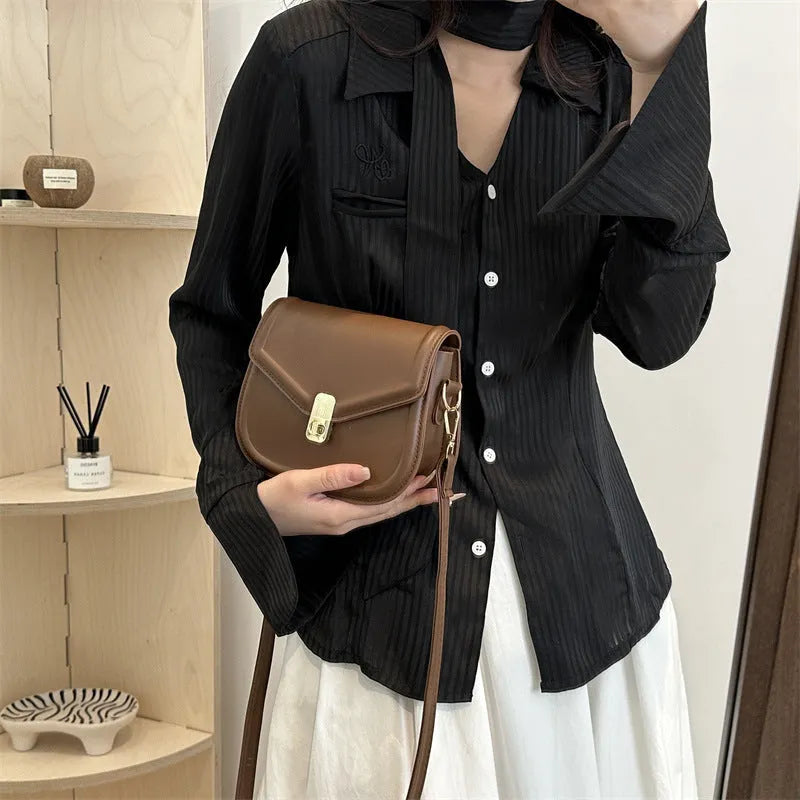 Soft black PU leather clamshell shoulder messenger bag shown open, featuring a horizontal square shape.