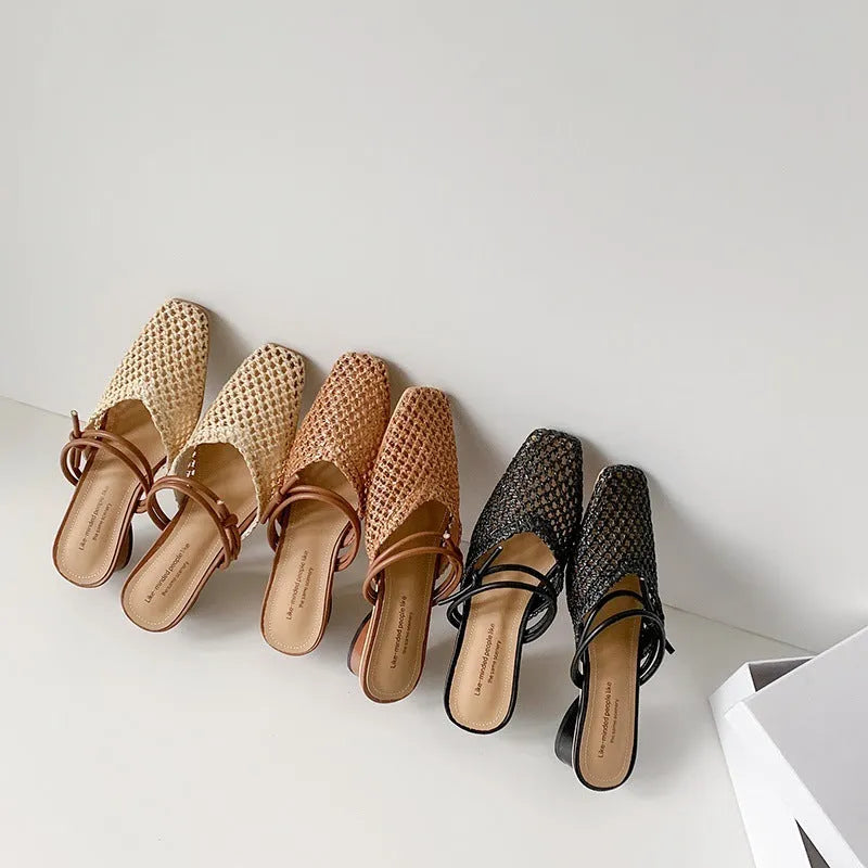 Women's black breathable outdoor slippers with square toe and chunky heel on a rubber sole.