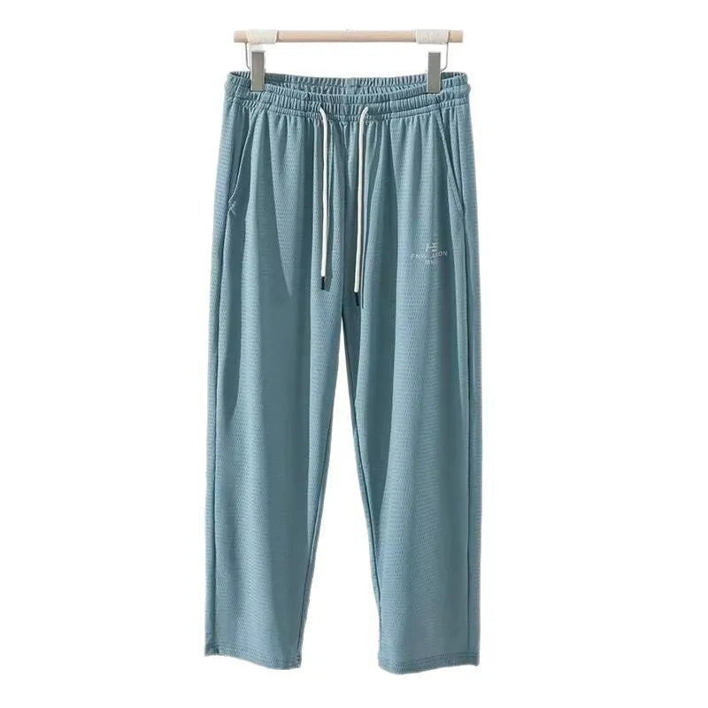 Men's loose ice silk quick-drying casual pants with elastic mesh, straight-leg high-waist, black colour