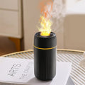 Car flame simulation aroma diffuser with automatic sprayer in black or white, showing dimensions 70×70×143mm