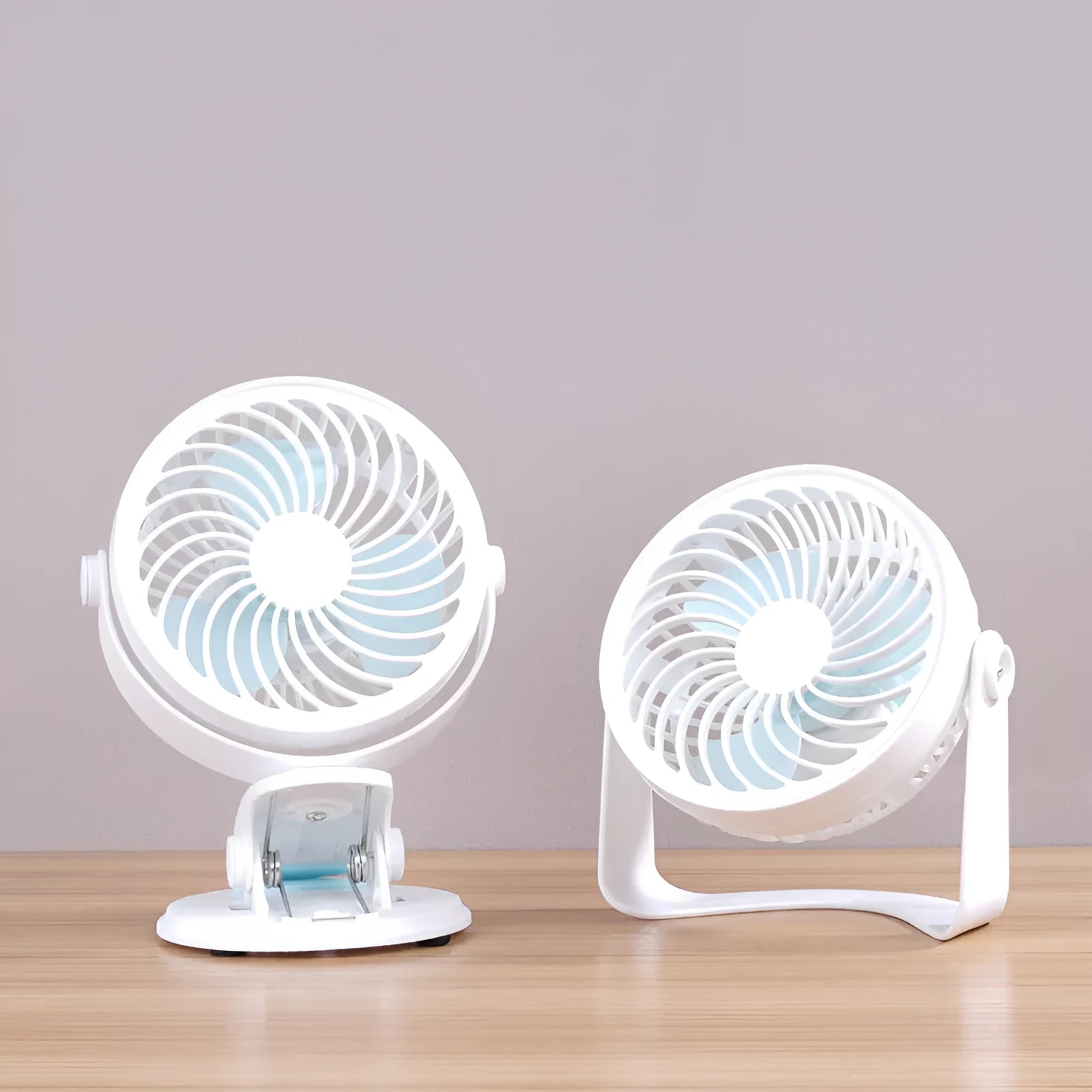 USB desk fan shown as both clip-mounted and floor-standing versions with three blades and mechanical dial control