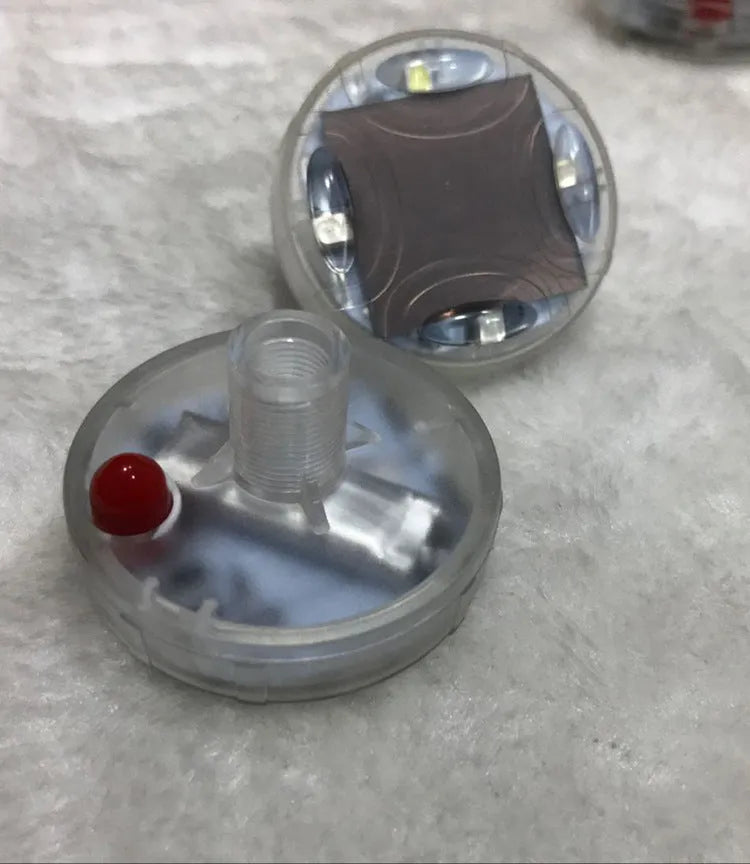 Colourful solar-powered LED decorative light for vehicle wheel hub installation.