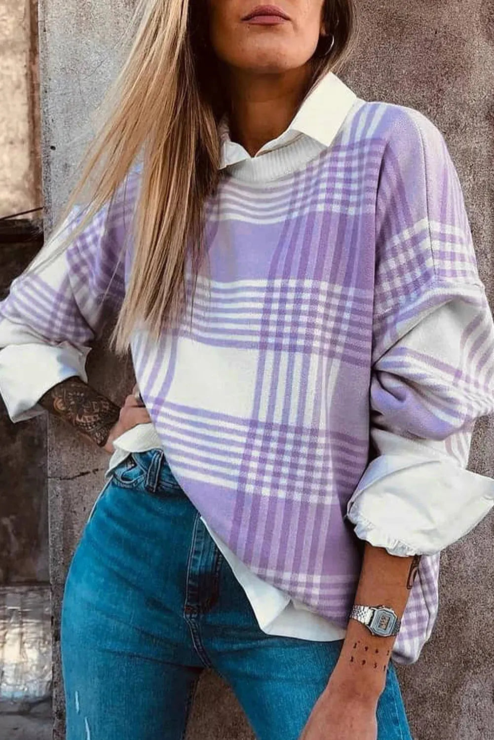 Lilac plaid print loose fit sweater with long sleeves and ribbed trim.