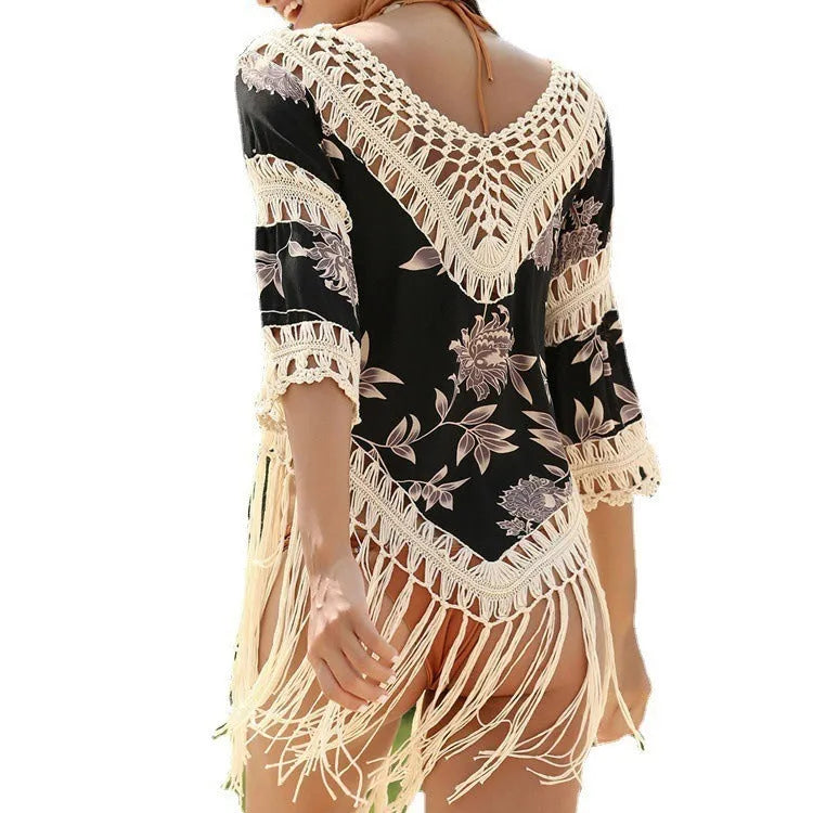 Women's apricot V-neck sun protection blouse with hollow-out sleeves on a hanger.