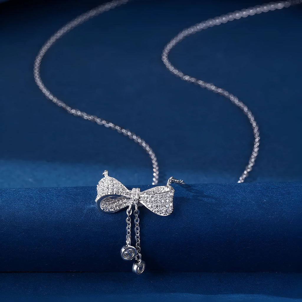 Women's sterling silver bow pendant necklace with O-ring chain, 40-45cm adjustable length