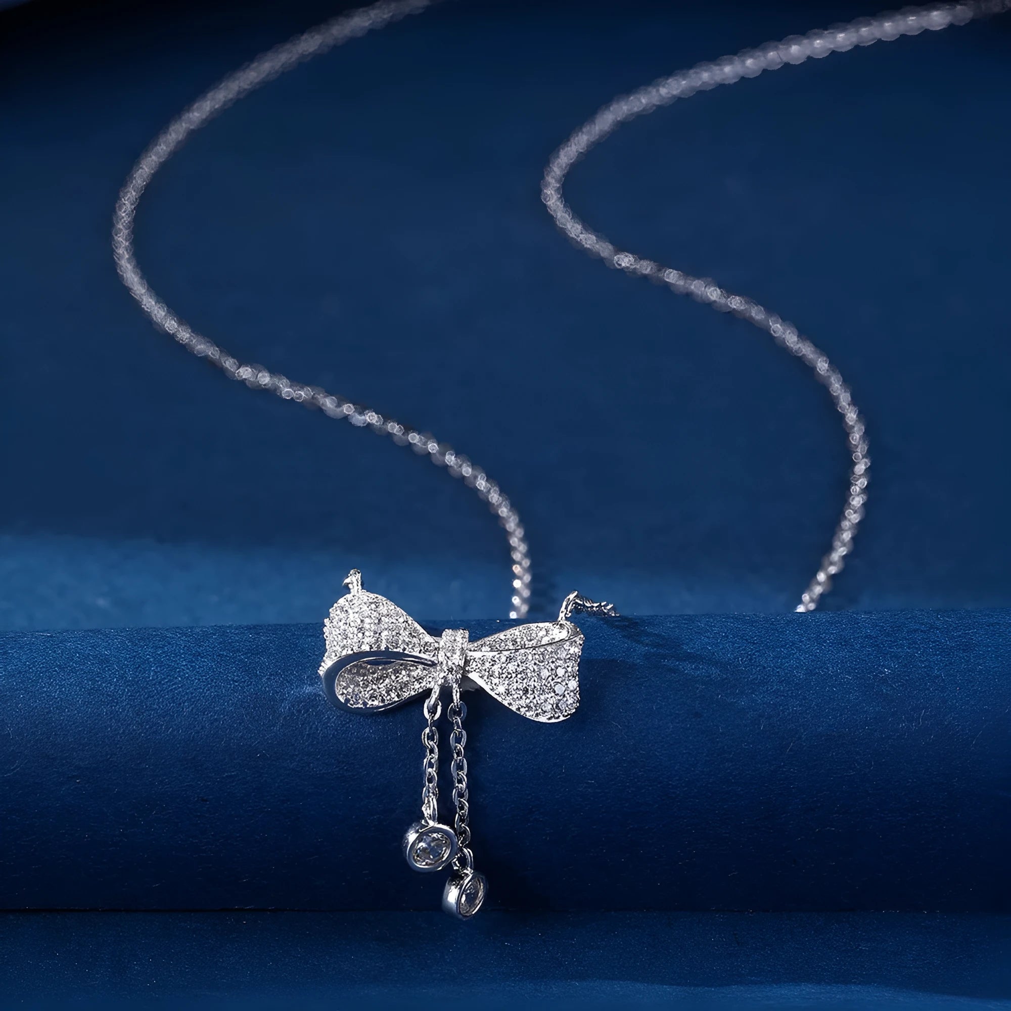 Women's sterling silver bow pendant necklace with O-ring chain, 40-45cm adjustable length