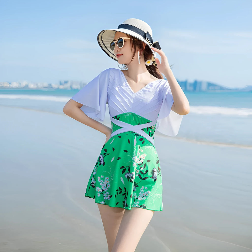 Women's green chemical fibre printed one-piece swimsuit shown front view for swimming use