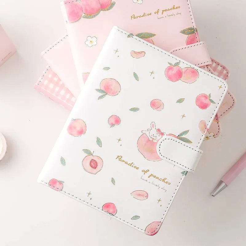 A5 hardcover student notebook with imitation leather cover in Peach Talk Feast design, wired binding, open flat