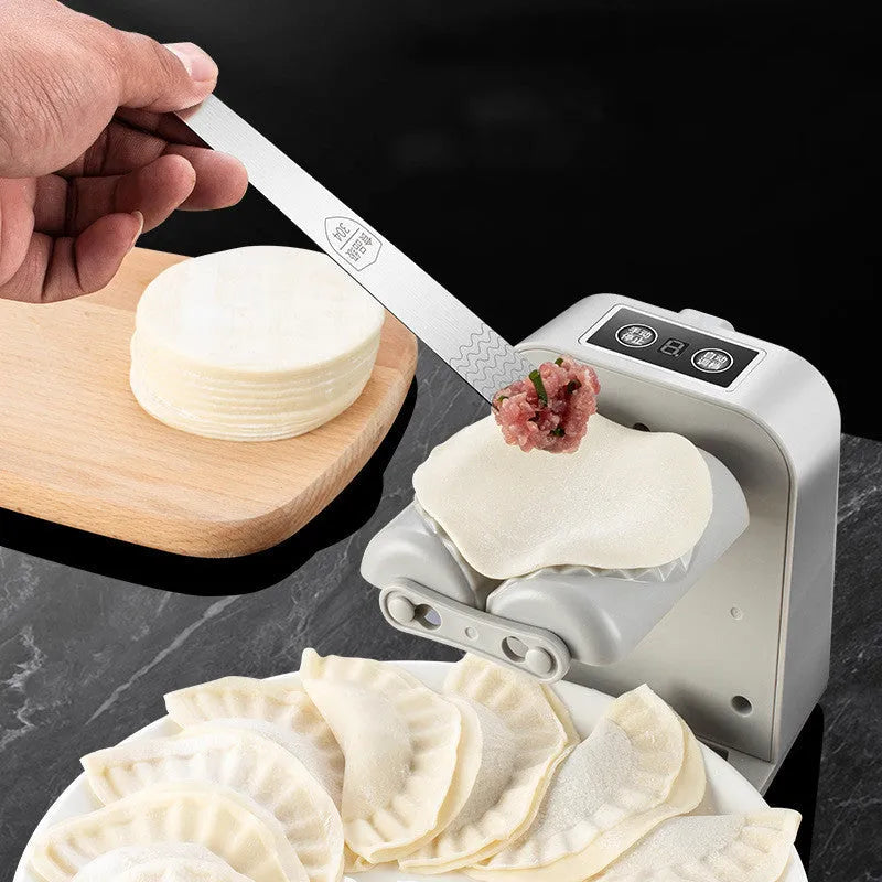 White electric automatic dumpling maker machine with USB power cord and accessories