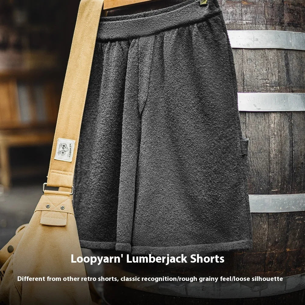 Cement grey American-style sport shorts with loose profile and straight-cut design for athletic wear