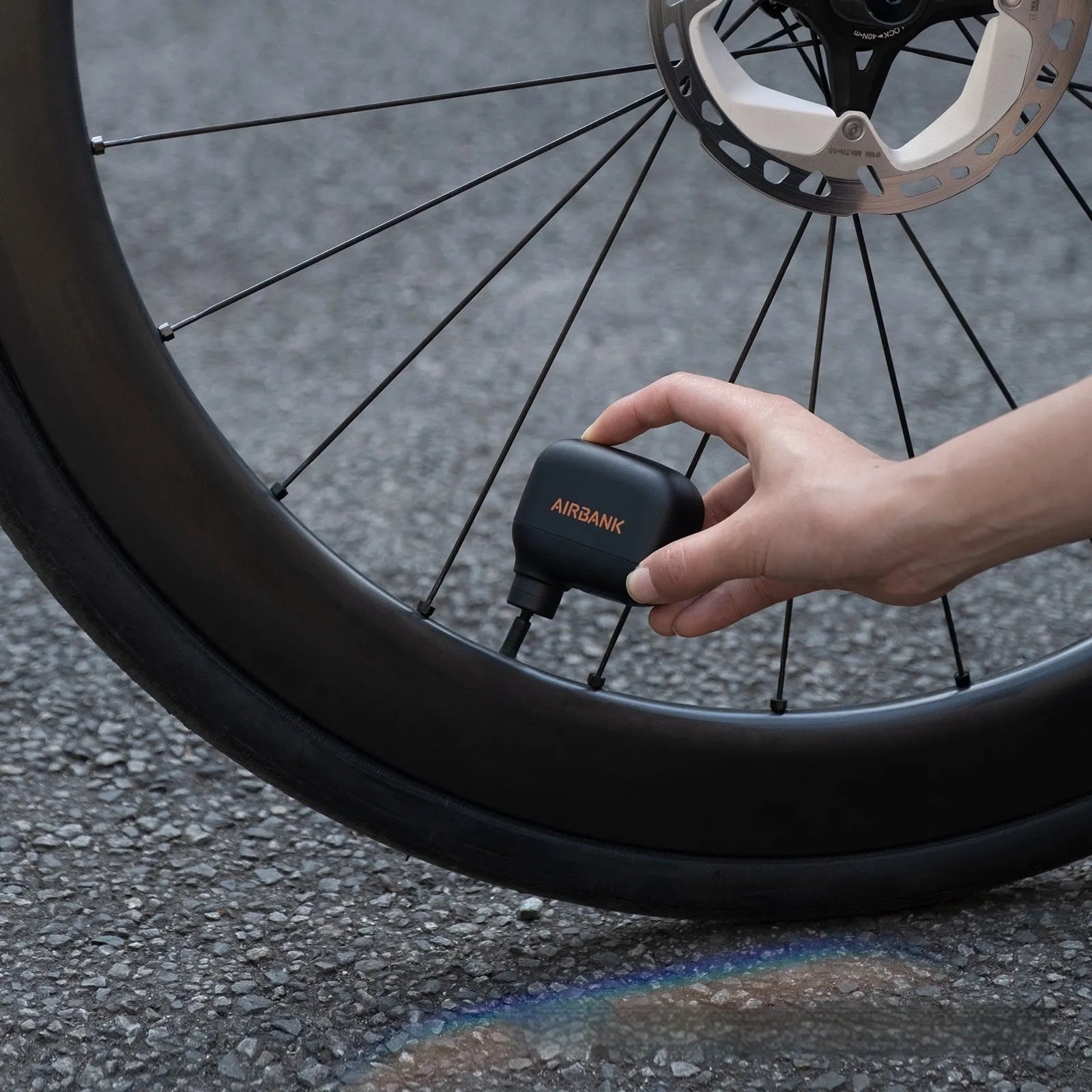 AS100 black electric bicycle inflation pump with USB cable and waterproof storage bag