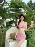 Women's pink and black three-piece polyester bikini swimsuit for swimming.