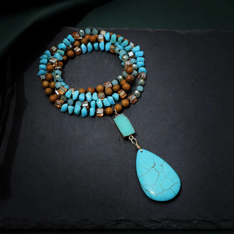 Turquoise blue geometric pendant necklace with ball bead chain measuring 81cm length