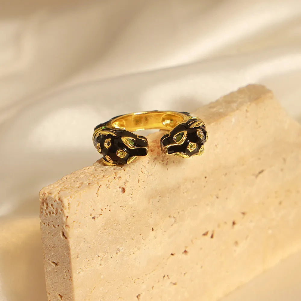 Black cheetah pattern open ring for women with geometric shape, size No. 7.