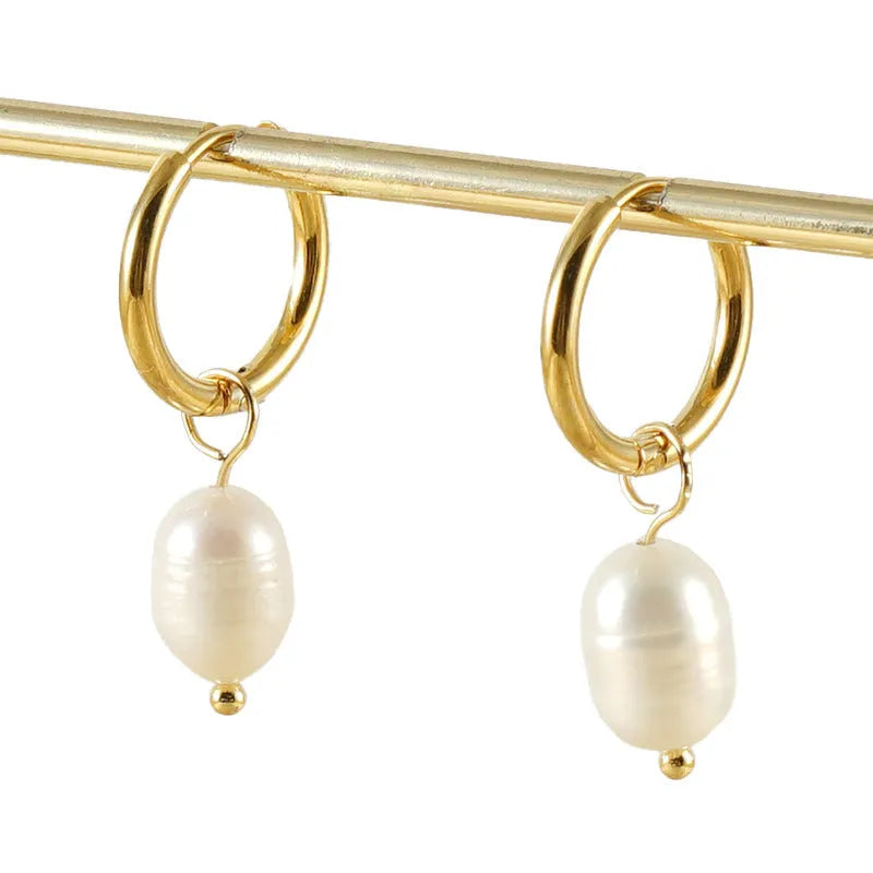 Gold geometric stainless steel earrings with pearl decorative elements