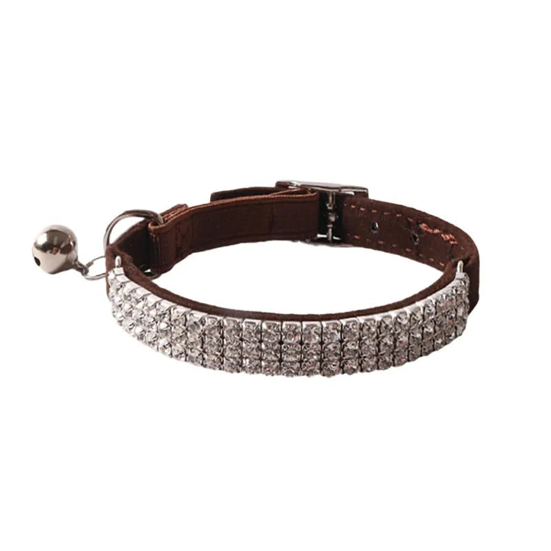Soft flocking cat collar with elastic buckle and gang drill design in multiple colours.