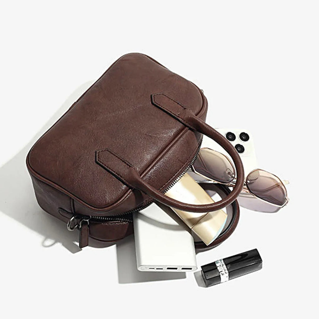 Retro small square simple shoulder messenger bag in black PU leather with horizontal shape and single strap