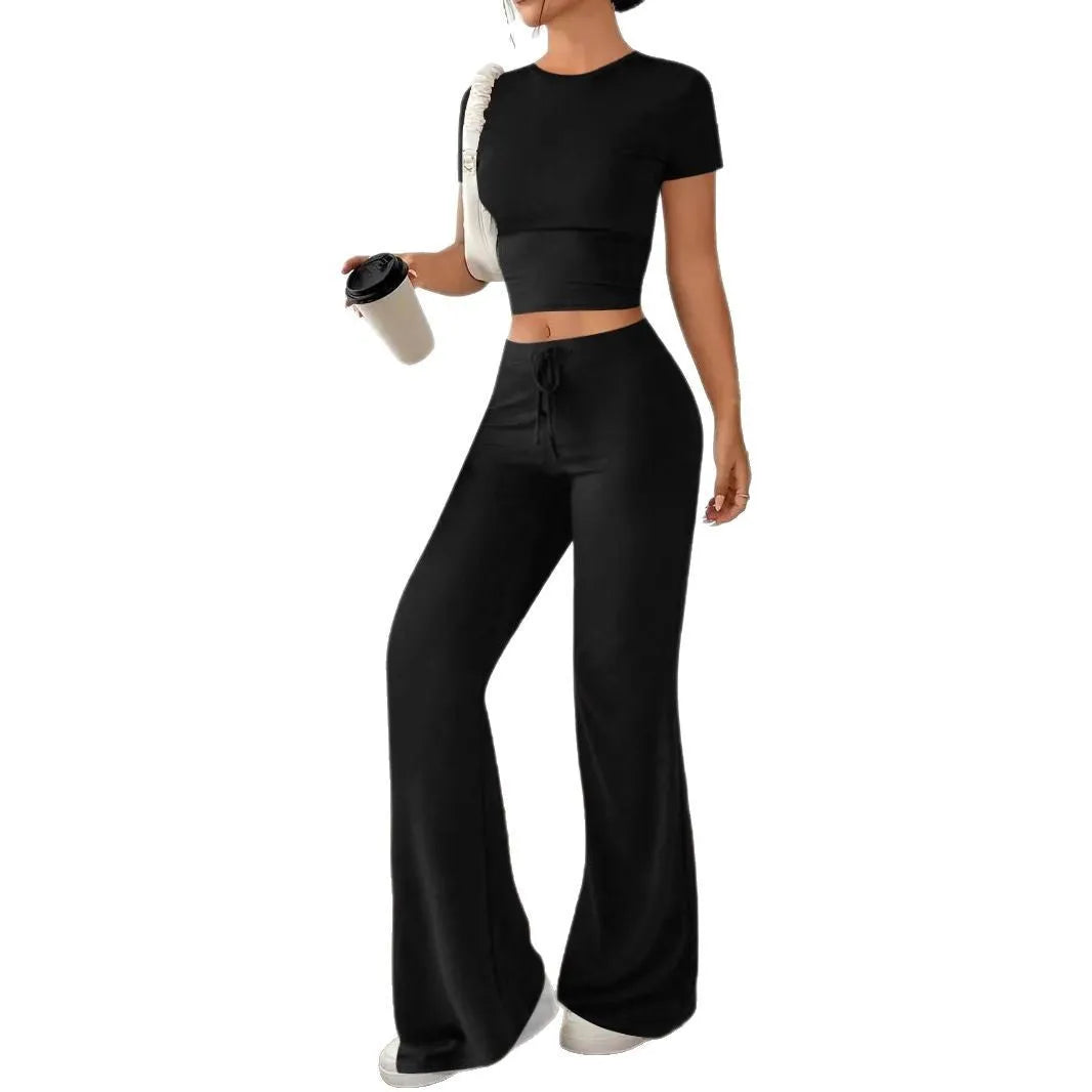 Women's black high-waist trouser and short-sleeve t-shirt suit set on hanger