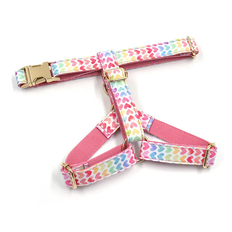 Pink colourful dog chest and back harness with gold buckle and heart-shaped stone on polyester strap