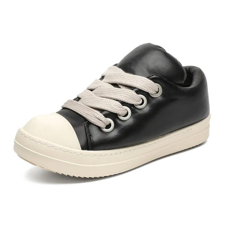Men's black leather low-top slip-on casual shoes with raised bottom board, round toe, and front lace-up