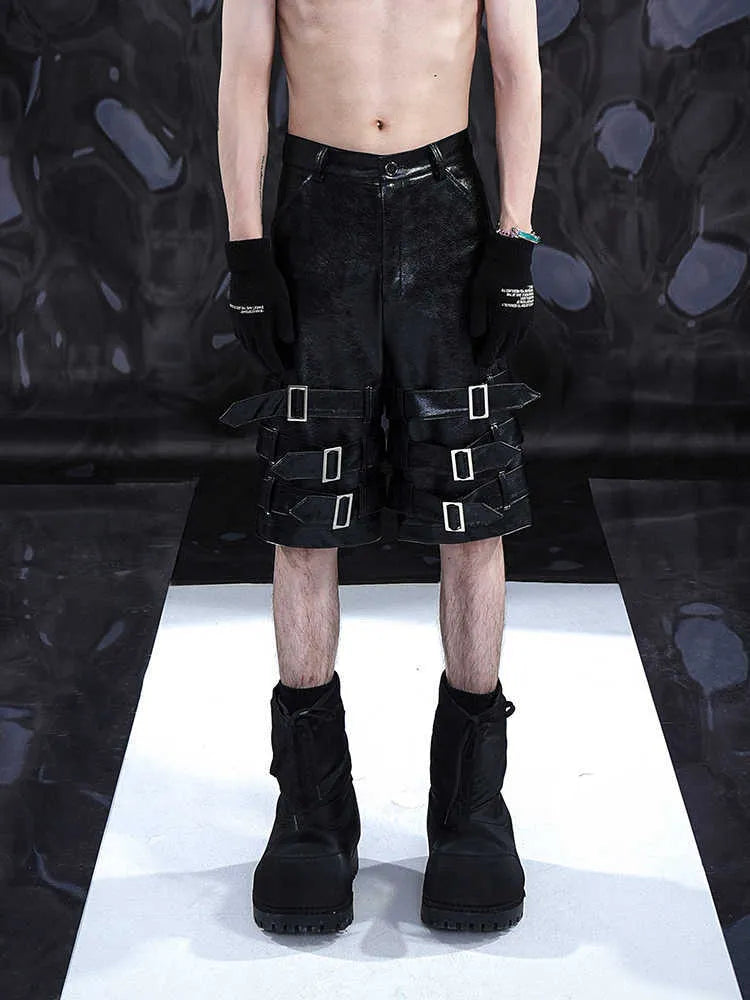 Black men's leather shorts with ring detail and cropped design