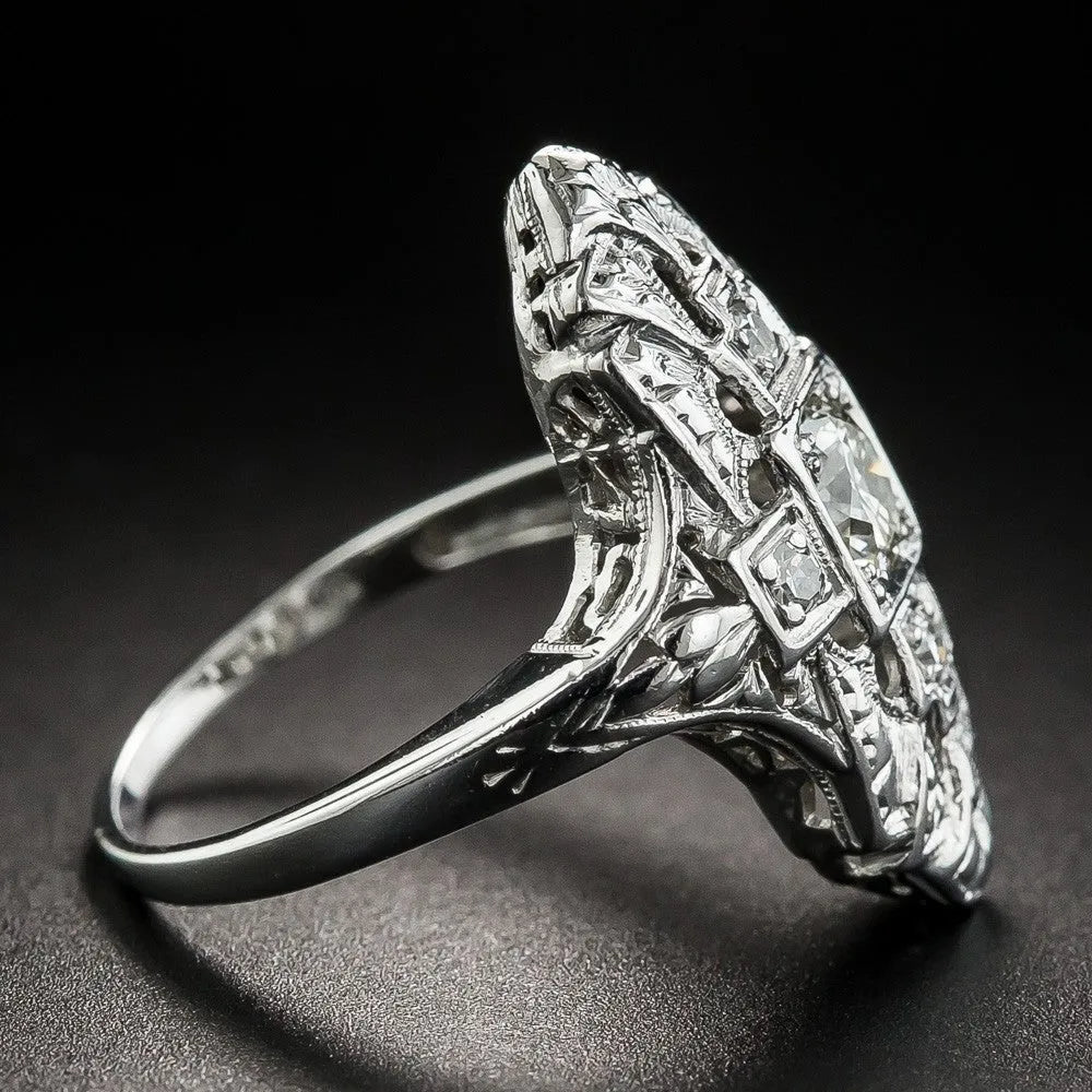 Hollow out geometric silver-colour ring with diamond studs on copper base.