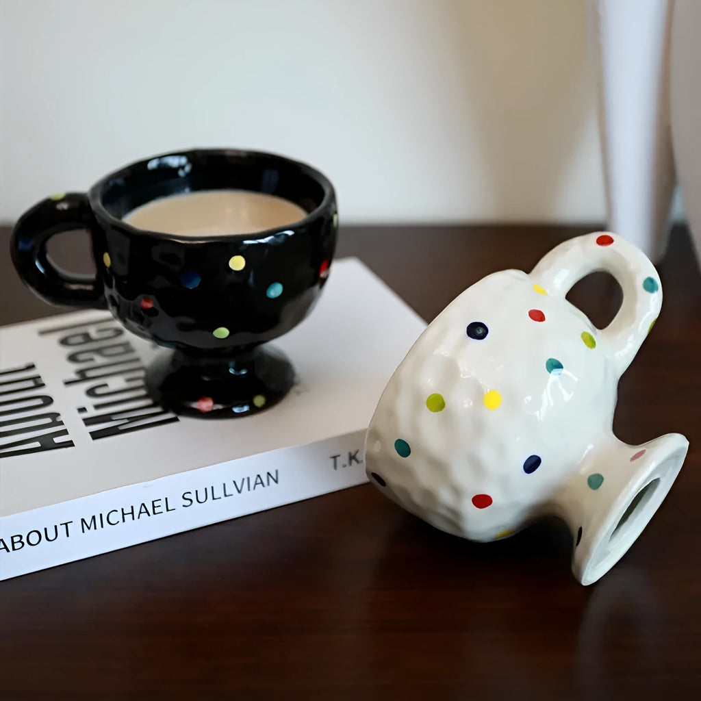 Hand-pinched irregular shaped ceramic mug in solid colour with 250ml capacity