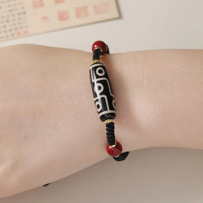Men's shrinkable Tibetan agate dzi bead bracelet with original design, brown and white agate beads on wrist