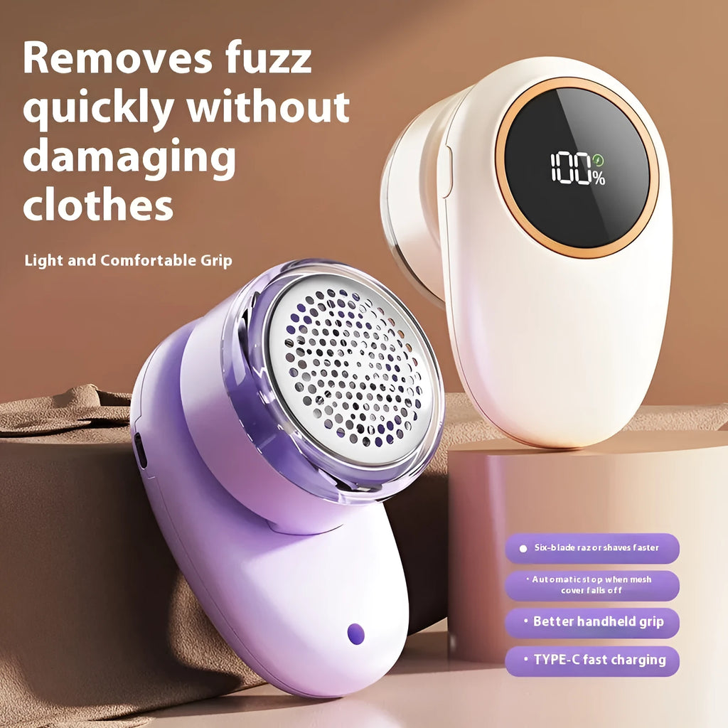 Purple and beige digital display fur ball trimmer with removable cutter heads on a fabric background