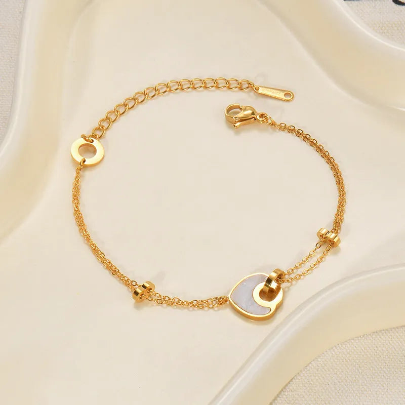 Women's stainless steel resin bracelet with double layered loving heart design in electroplated finish