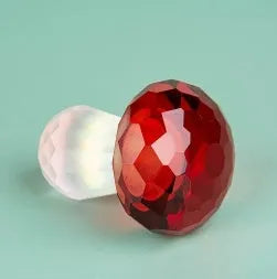 Colourful crystal mushroom decorative ornaments in geometric style on white background