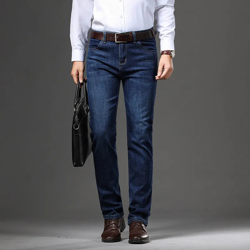Man wearing black high-elasticity loose-fit straight-leg jeans, business casual style