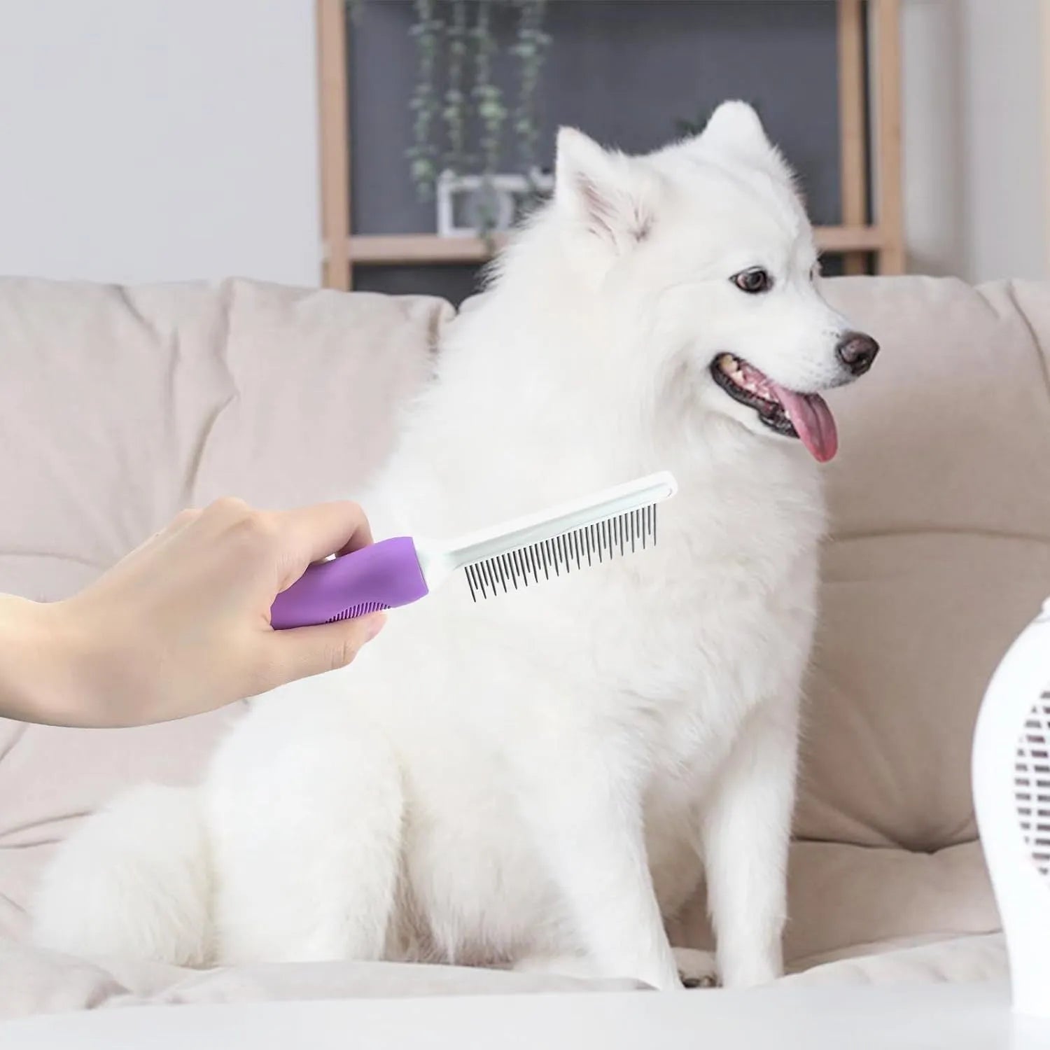 Purple pet detangling comb with stainless steel teeth and ergonomic handle for dog and cat grooming
