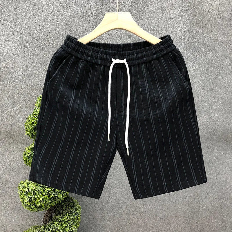 Men's black and white striped fleece-lined casual shorts with straight leg and ankle banding