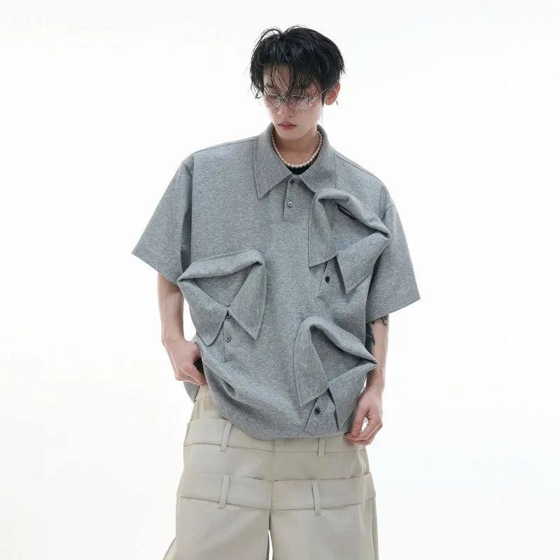 Men's black polo shirt with deconstructed collar and geometric pattern design