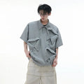Men's black polo shirt with deconstructed collar and geometric pattern design