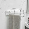 Nordic folding carbon steel towel bar in black mounted on bathroom wall
