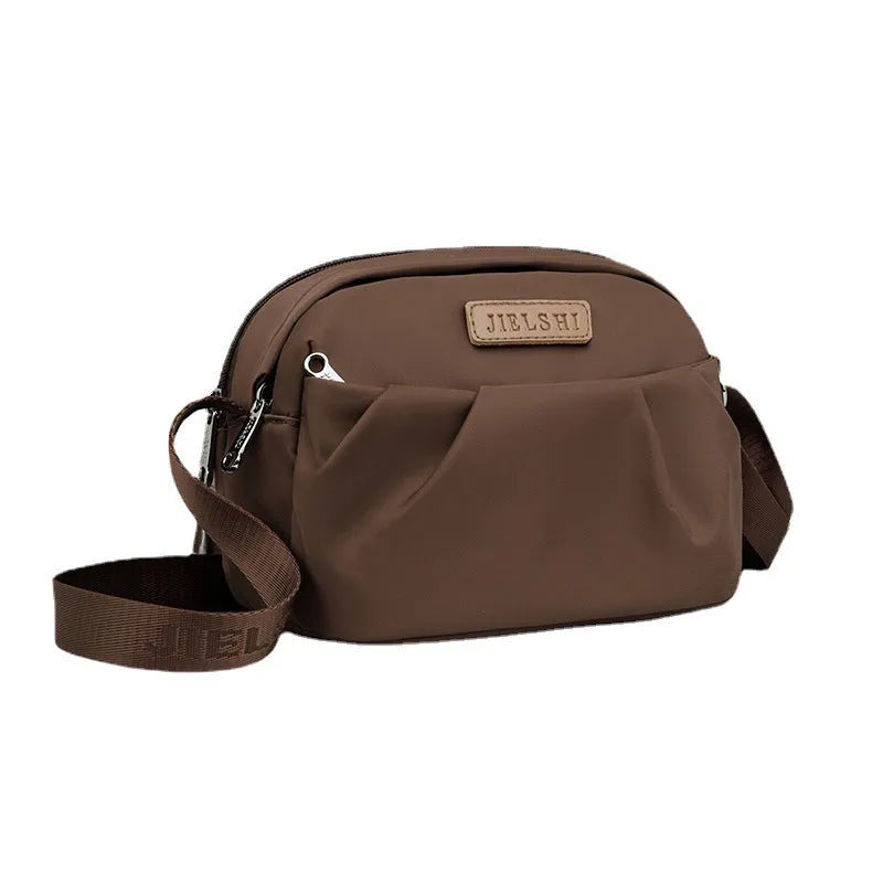 Pleated Oxford cloth shoulder messenger phone bag in horizontal square shape with single strap