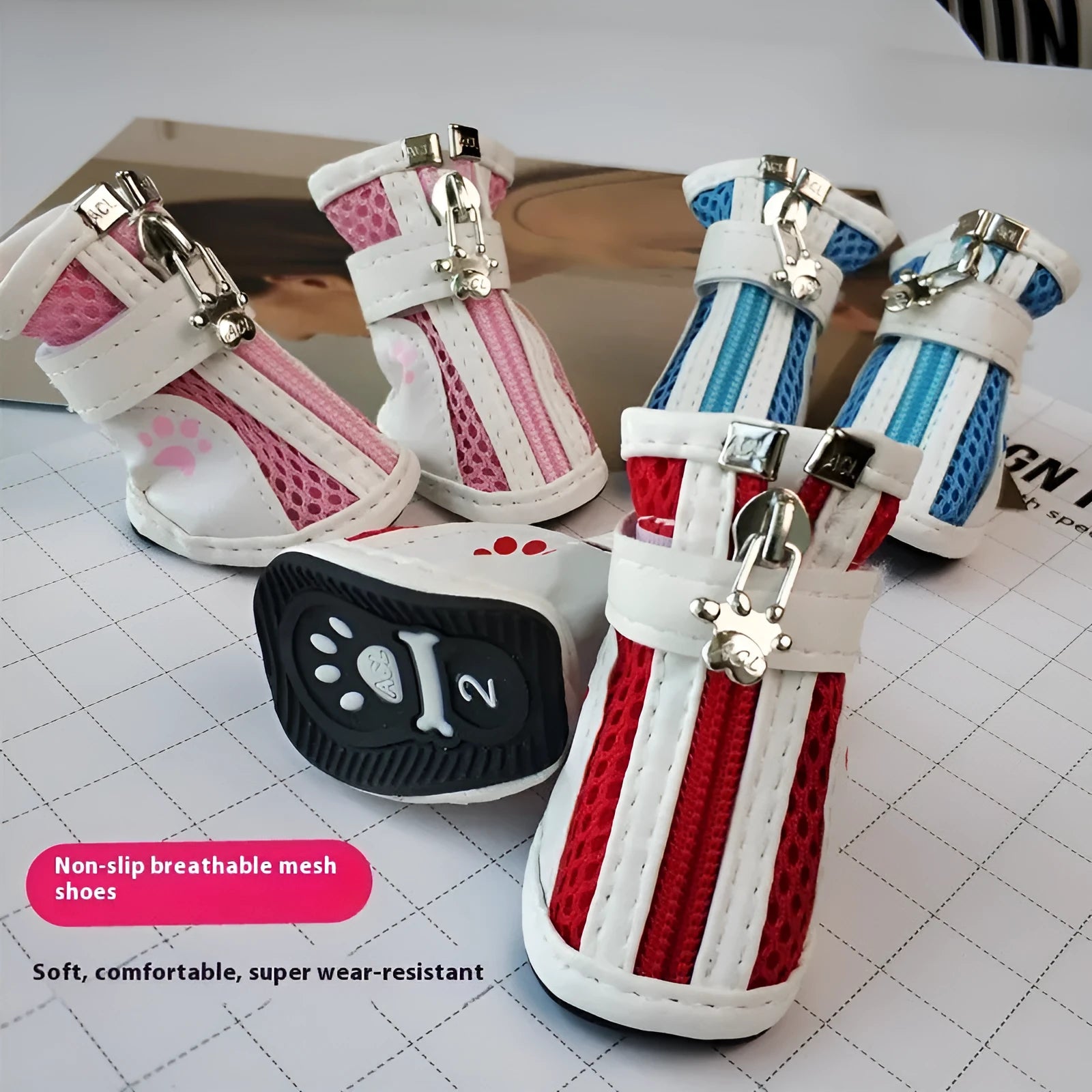 Blue zipper dog shoes for small pets showing non-slip sole and fleece lining.